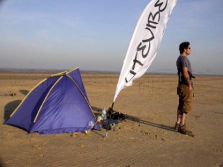 A beautiful day on the beach for kitesurfing